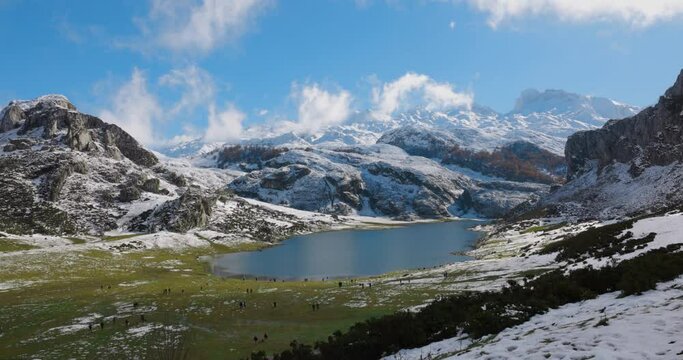 Lakes of Covadonga in Asturias with snowy mountains