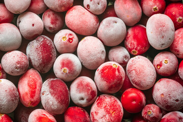 frozen red cranberries background closeup