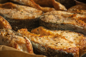cooked salmon filets on baking tray closeup