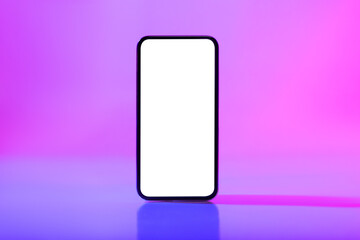 Modern smartphone with empty white screen in neon light, mockup for new mobile app or website design