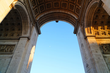 View of the landmarc Arc de Triomphe monument on the Champs-Elysees in Paris, France