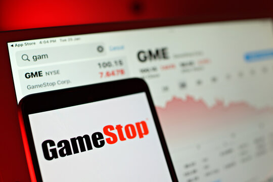 Penang, Malaysia - 25 JAN 2022: GameStop Corp stock index and logo seen on a display screen. GameStop (GME) are up sharply from a year ago, but they're off to a brutal start in 2022. Soft focus.