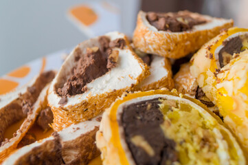 Oriental sweets, pastille roll with sherbet and nuts. Sweet dessert. Soft focus