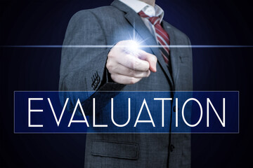 Evaluation - lettering, businessman pointing finger