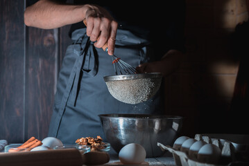 The chef prepares the dough for sweets, sweet pastries.