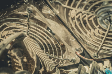 Dusty fan of the cooling system of the computer processor. Dirt on the fins of the radiator....