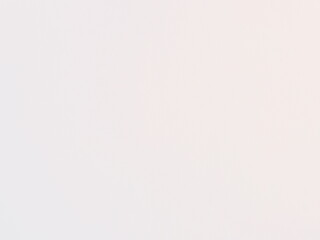 Concrete surfaces and walls painted in white. Artistic plaster. New stained paper wallpaper for design work with copy space or white design background. 
