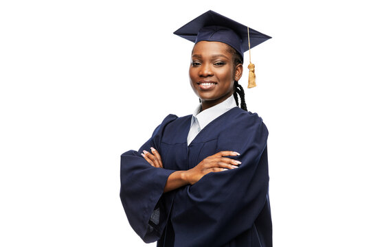 education, graduation and people concept - happy graduate student woman in mortarboard and bachelor gown