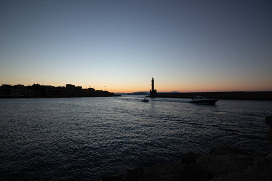 A night photo of the lighthouse in Chania city crete