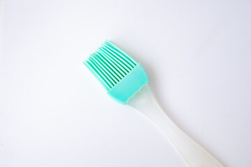 Silicone Cooking Baking Brush, Kitchen Utensil. Isolated on white background Copy space Close-up Horizontal image