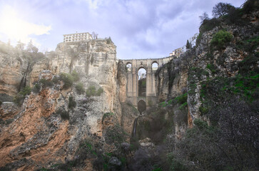 view of the New Bridge in Ronda with sunbeams
