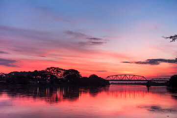 Fototapeta na wymiar Landscape with beautiful sunset overlooking the river in Los Llanos, Colombia.