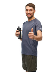 fitness, sport and healthy lifestyle concept - smiling man in sports clothes with bottle showing thumbs up over white background