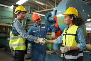 Industrial Engineers in Hard Hats.Work at the Heavy Industry Manufacturing Factory.industrial worker indoors in factory. man working in an industrial factory.