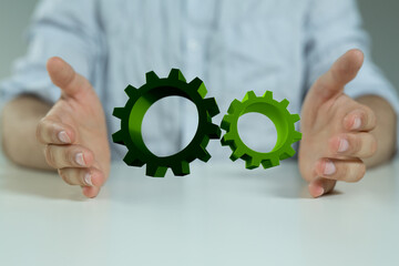 Mechanism green gears and cogs at work on black background. Industrial machinery. 3D illustration....