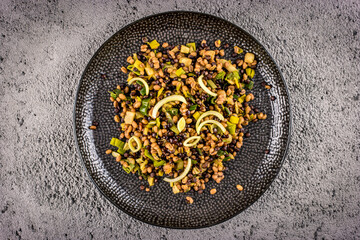 Roasted barley groats and lentils with leek, top view