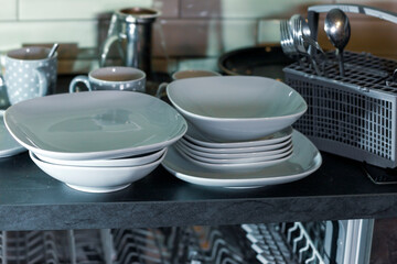 clean tableware on a kitchen table