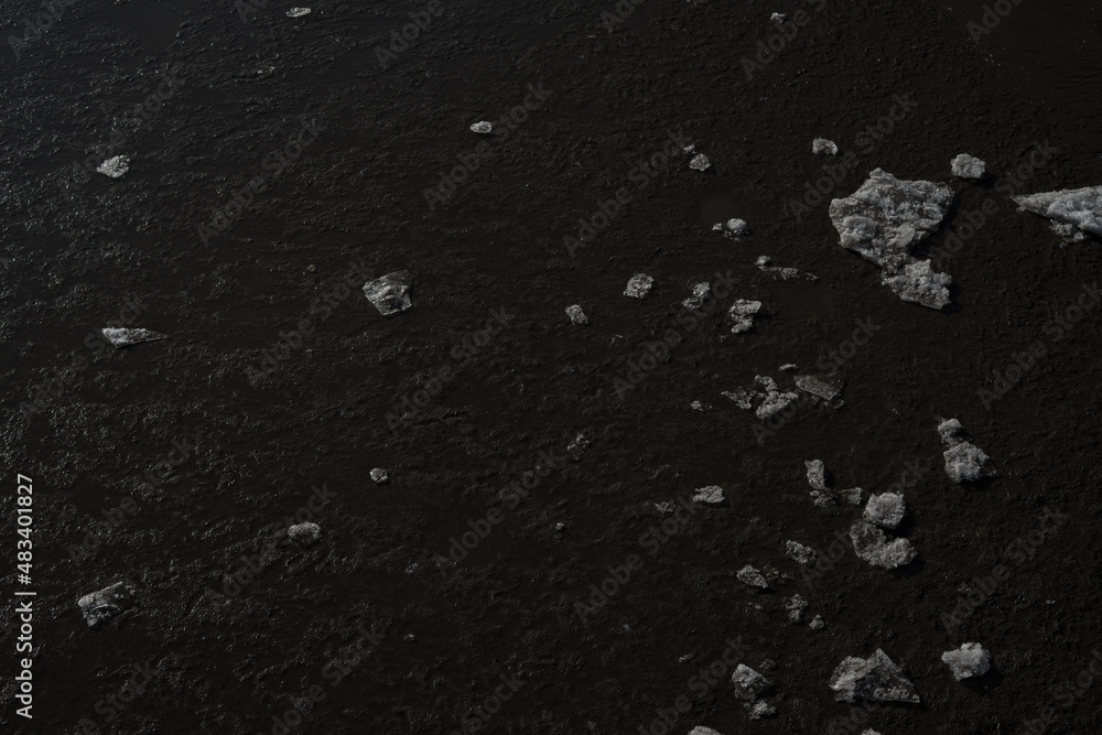Poster a grayscale of ice structures isolated on a dark surface