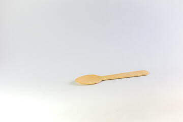 A picture of a wooden spoon in a white background