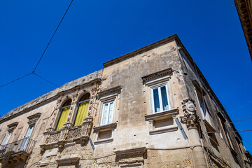 Fototapeta na wymiar Empty street low-angle architectural view, Lecce, Brindisi, Italy