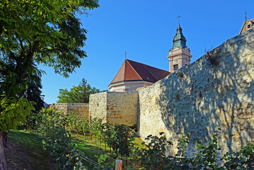 Ringmauer mit evangelischer Kirche in Rust am See - obrazy, fototapety, plakaty