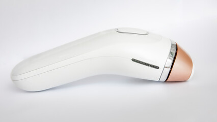 Head of an IPL `Intense Pulsed Light` laser hair removal home device - obrazy, fototapety, plakaty