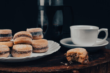 cup of coffee with cookies