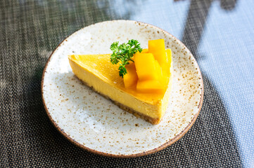 Mango cheese cake with fresh mango fruit on topping