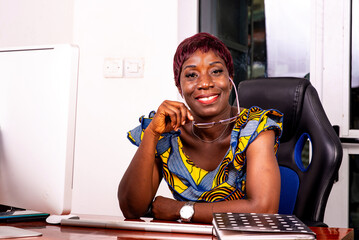 beautiful adult business woman smiling in office