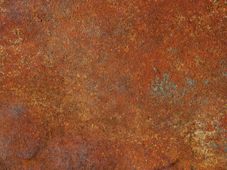 Orange metal plate with weathered colors and rust. Corrosion. Old oxidized colorful textured surface. Abstract grunge rusty metallic background for multiple uses.