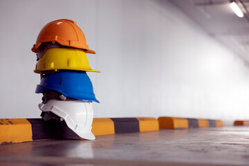 Multicolored Safety Construction Worker hardhat. Teamwork of construction team must have quality....