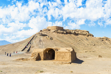 Ruins of ritual buildings in front of Dakhmeh Zoroastrian Tower of Silence, Yazd, Iran