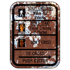 Old rusty American road sign - Crosswalk signal instructions