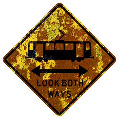 Old rusty American road sign - Light rail crossing, Look both ways, California