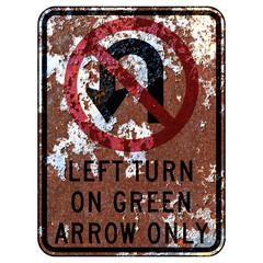 Old rusty American road sign - No U-turn - left turn on green arrow California