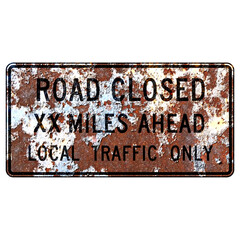 Old rusty American road sign - Road Closed Ahead