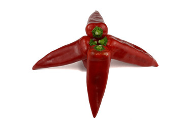 Group of red pointed peppers on pure white background.