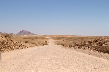 Fototapeta na wymiar Long Dirt Road in Namibia