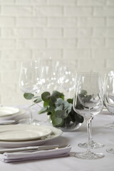Stylish elegant table setting in restaurant. Space for text