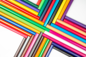 set of colored pencils for drawing on a white background. artistic creativity of drawing. color...