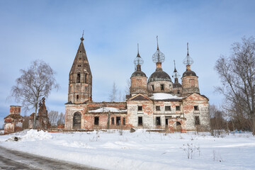 Fototapeta na wymiar Abandoned church in winter, abandoned temple in outback of Russia