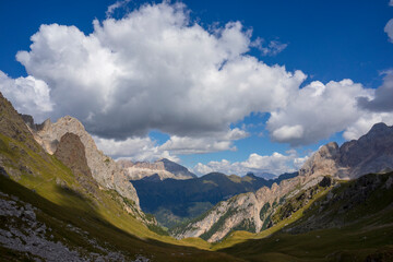Fototapeta na wymiar View from the Lino Pederiva mountain trail to Colac and Sella Group. Dolomites.