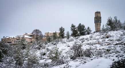Fototapeta premium A Water Tower on a Snowy Mountain