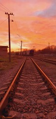 Naklejka na ściany i meble railway at sunset