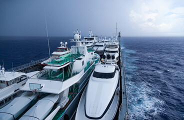 Fototapeta premium Transportation of yachts across the ocean.