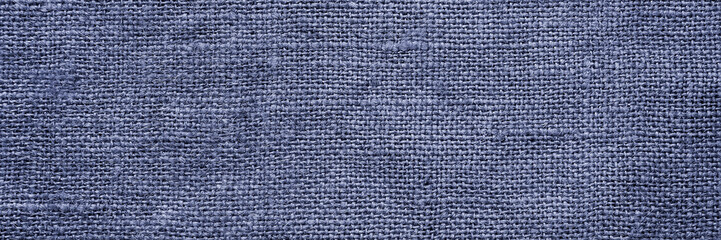 Abstract sackcloth background. Trendy very peri color concept of the year 2022, violet blue