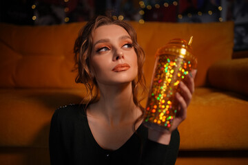 girl with shiny cup. High quality photo
