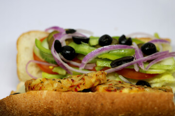 sandwich, isolated on white background. Gourmet toast or sandwich with veg petty lettuce, tomato, chess ,olive , onion healthy eating
