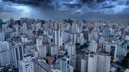 Aerial view of Av. Paulista in São Paulo, SP. Main avenue of the capital. With many radio antennas, commercial and residential buildings. Aerial view of the great city of São Paulo. Rainy sky