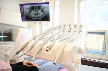 dentist equipment and X-ray photo in the background
